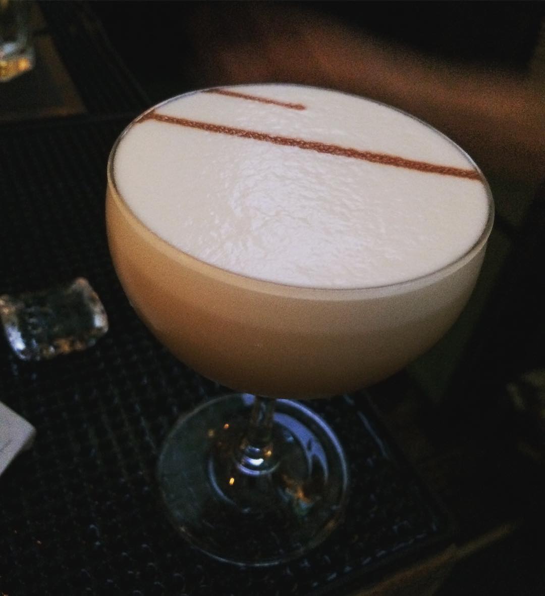 100 Sour off of our New Cocktail Menu: #lairdsapplebrandy #smithandcross #rittenhouserye lemon juice, Cinnamon syrup, fresh egg white and #feebrothers bitters