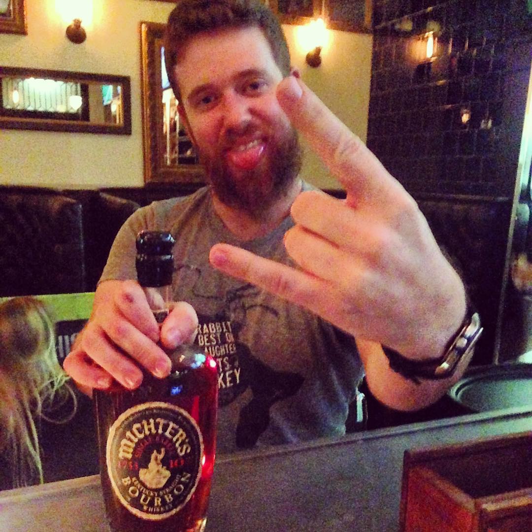 When @ian.the.whiskeyginger wearing his @deadrabbitnyc shirt gets stoked about the @michterswhiskey and throws up dem horns! #bourbon #whiskey #glencairn #cocktailbar #whiskeyneat #michters10 #statecollegepa #glencairn #rockstar